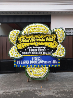 Papan Bunga Duka di Mulo