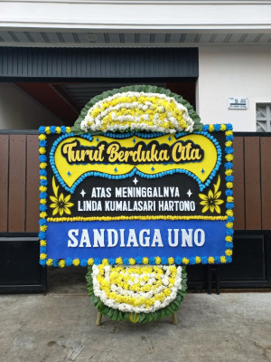 Papan Bunga Duka di Mulo